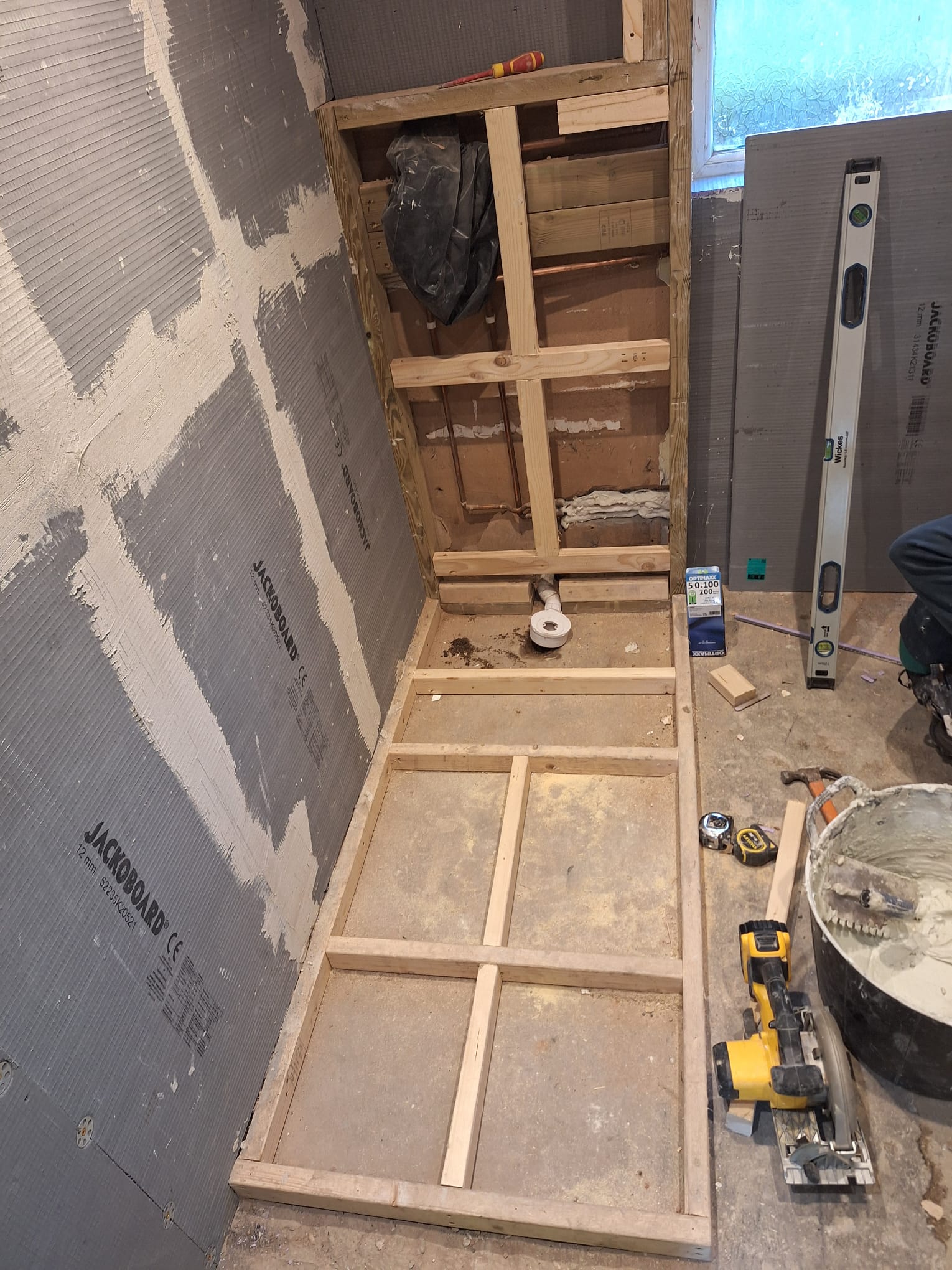 During tiling and built-in installation